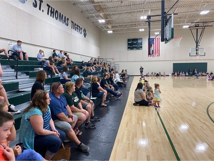 Parents listening to morning announcements.